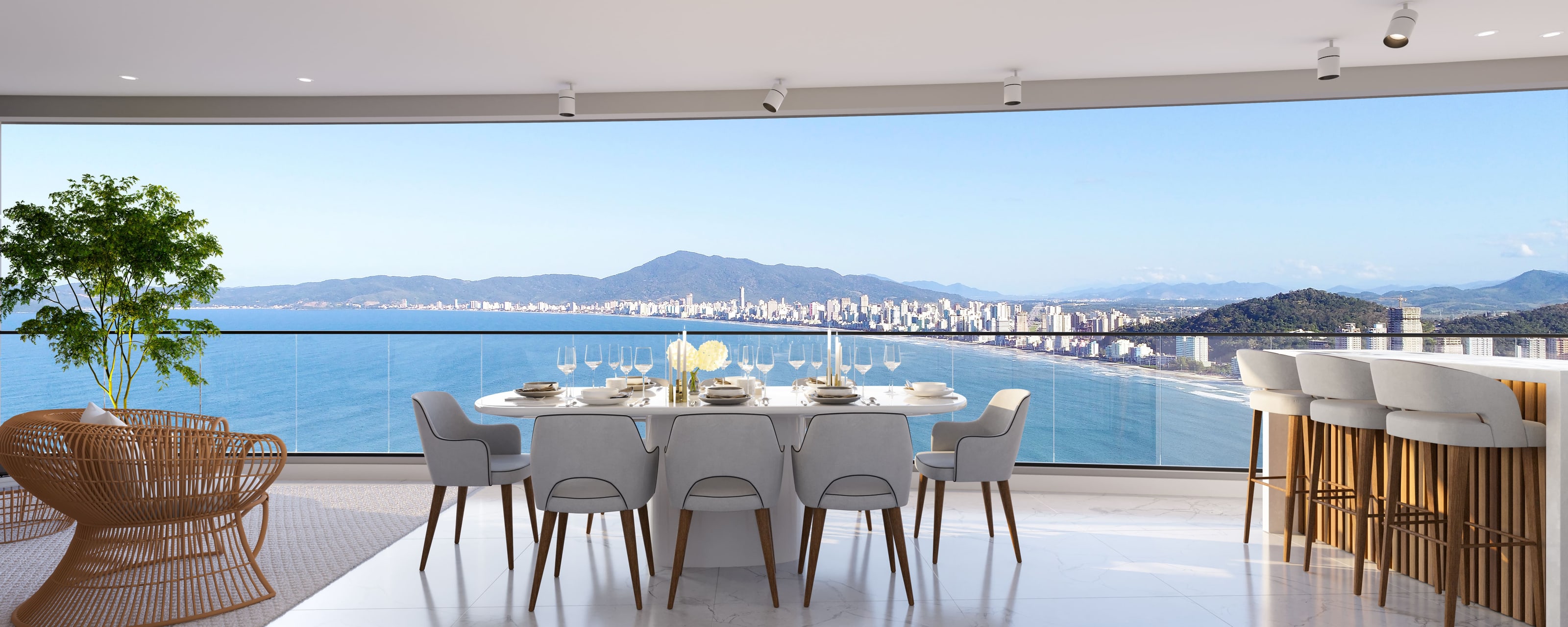 Living e área de jantar do apartamento Celine com vista panorâmica para o mar